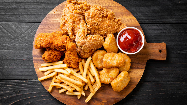 Chicken nuggets and fries on tray