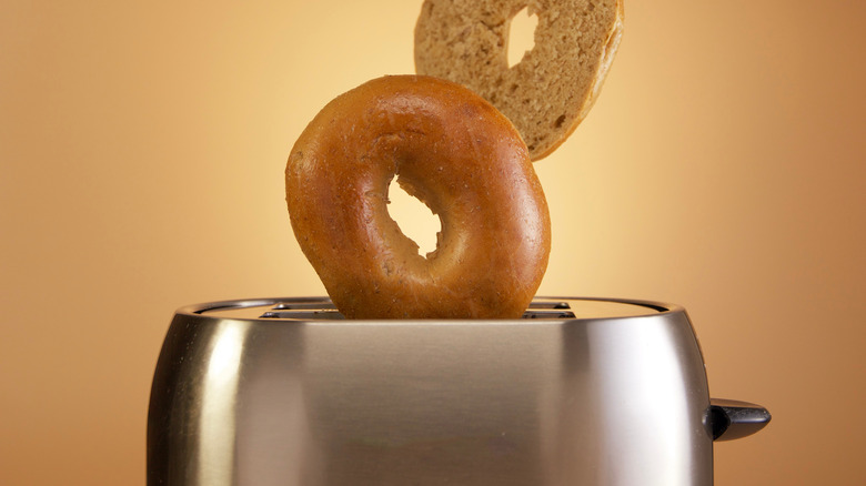 Bagels popping out of toaster