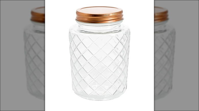 glass jar with gold tone lid