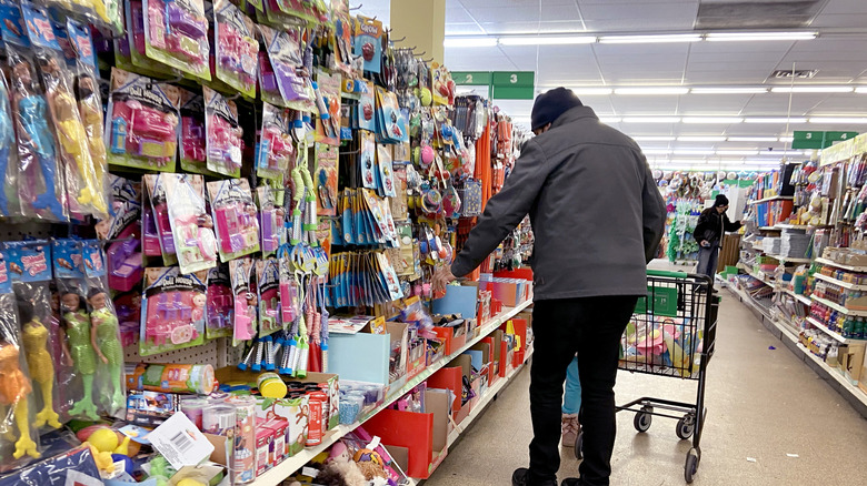 man shopping at Dollar Tree