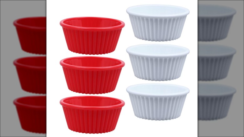 six red and white plastic ramekins