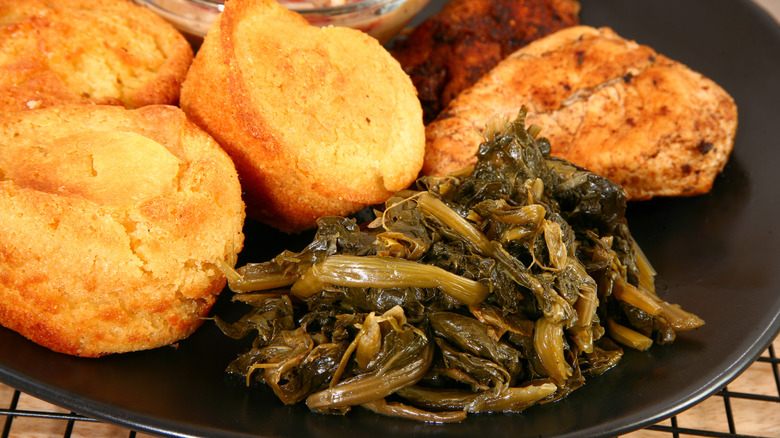 Turnip greens on plate with cornbread