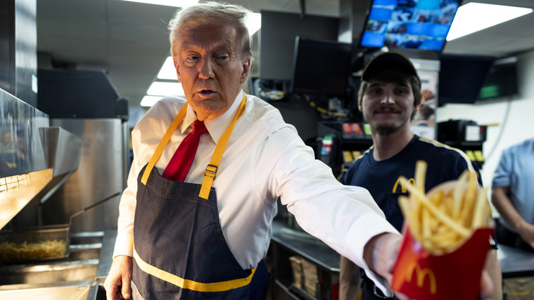 Donald Trump serving french fries at McDonald's