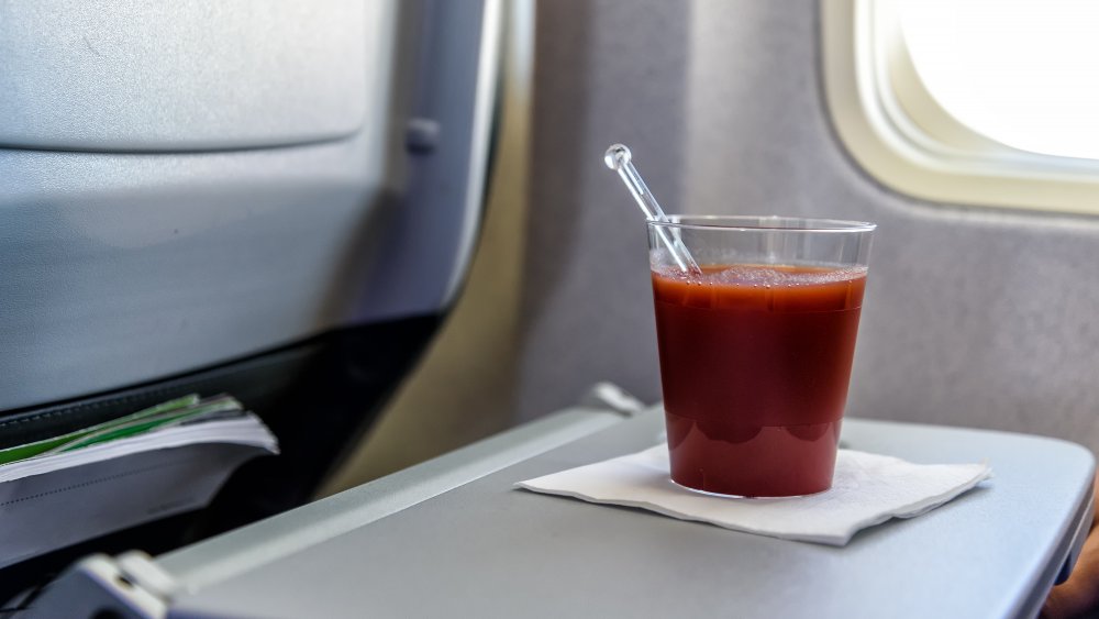 Bloody Mary by an airplane window