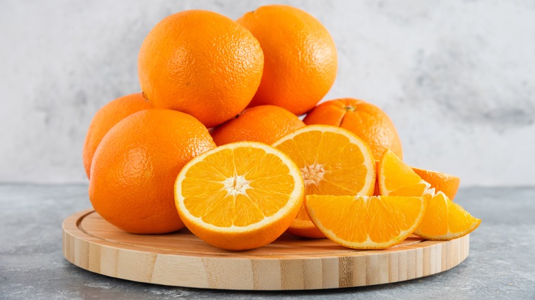 Oranges on a wooden board