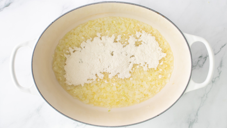 flour and melted butter in a white pot
