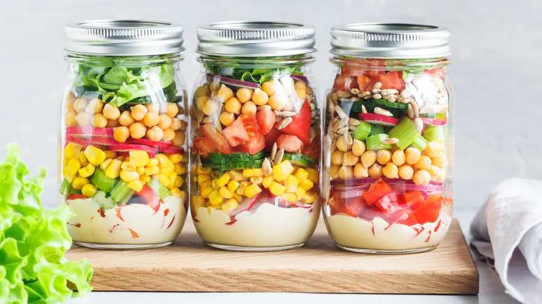 three jarred salads