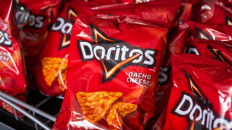 Bags of Doritos on a store shelf