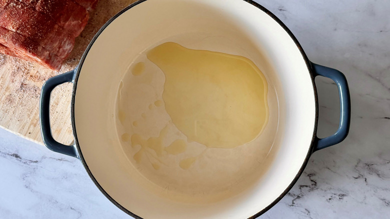 Drizzle of oil in Dutch oven