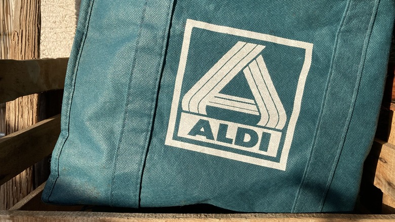 Aldi shopper with orange bag