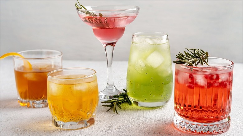 assorted cocktails with garnishes