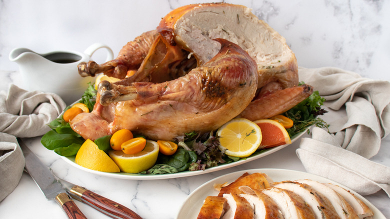 whole and sliced roast turkey