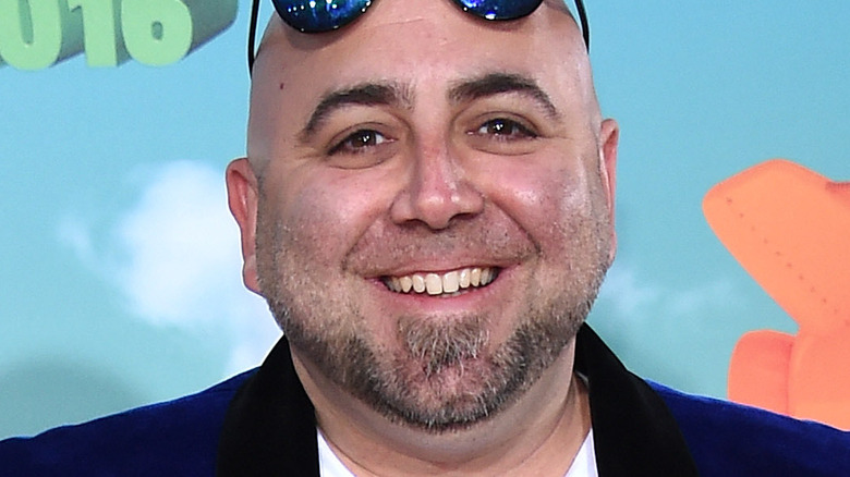 Duff Goldman smiling with sunglasses