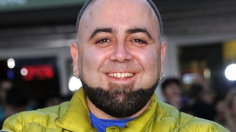 Duff Goldman in green jacket smiling