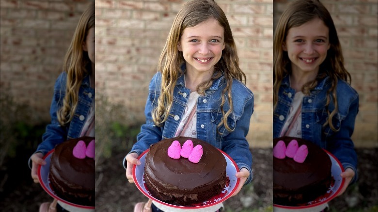 Girl holding Easter cake