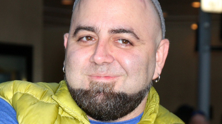 Duff Goldman wearing earrings