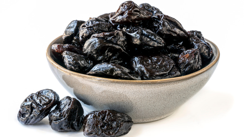 Bowl of pitted prunes