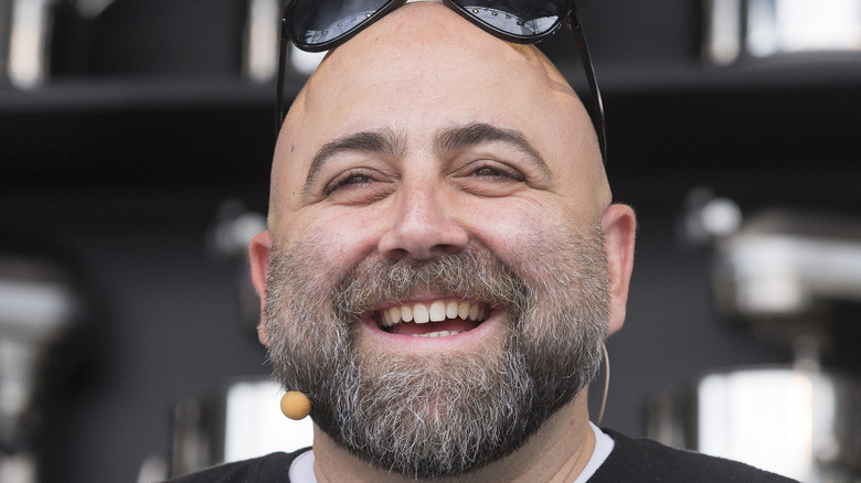 Duff Goldman with sunglasses and microphone