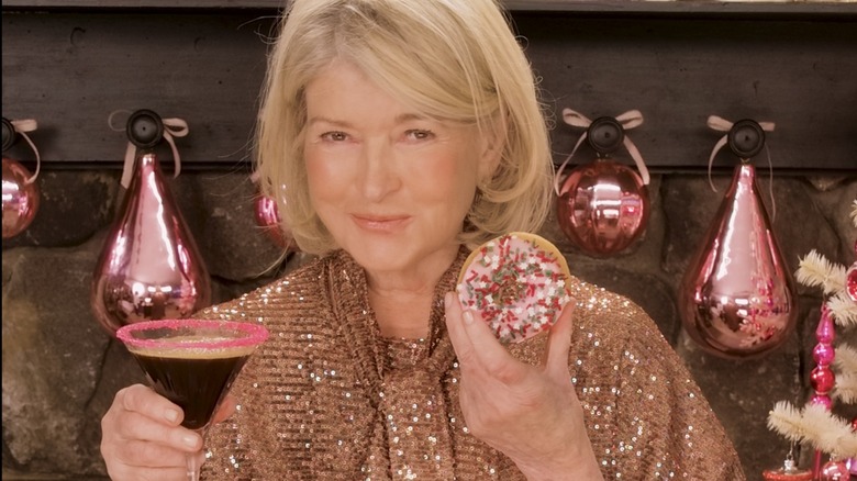 Martha stewart holding martini and donut