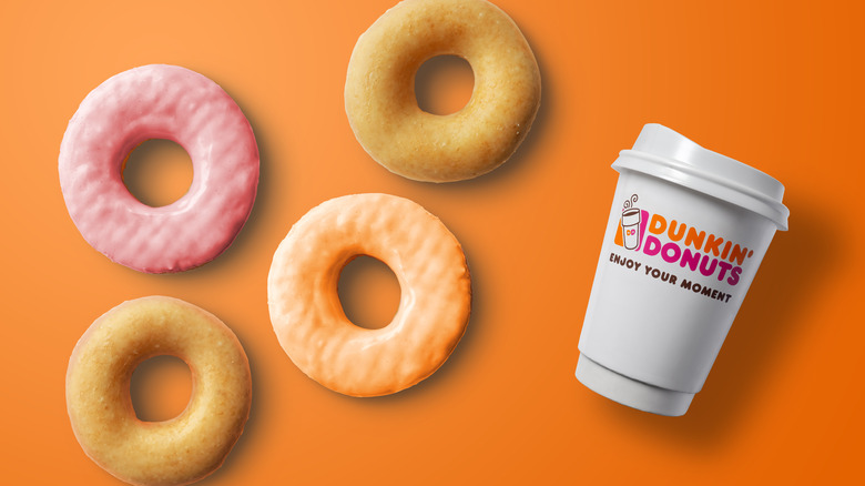 A Dunkin' coffee with donuts