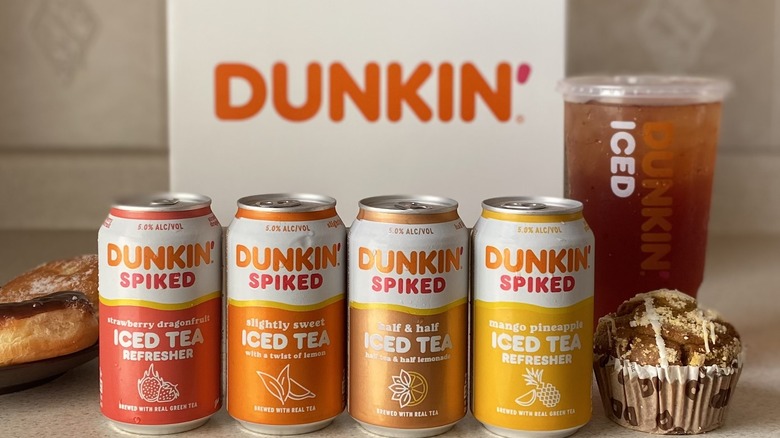 Dunkin' Spiked Teas surrounded by food items