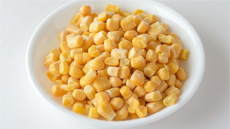 Bowl of frozen corn kernels