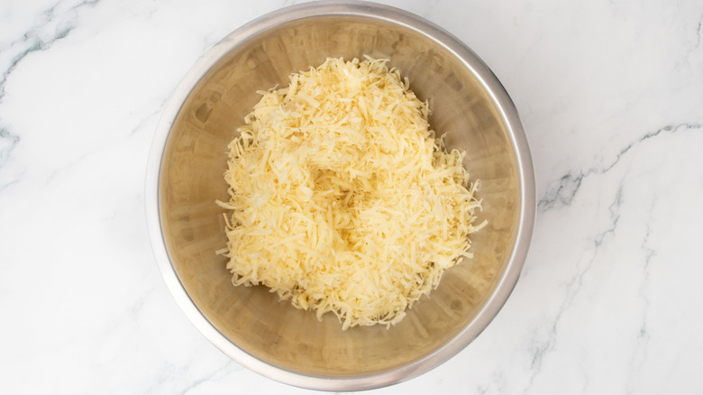 Grated cheese in bowl