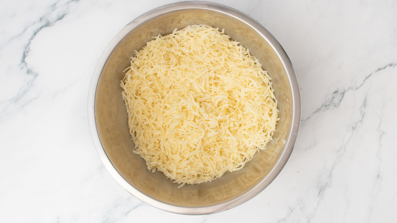 Grated cheese in bowl