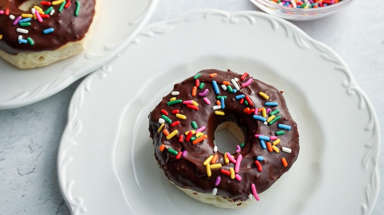 chocolate donut on white plate