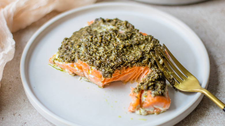 baked pesto salmon on plate 