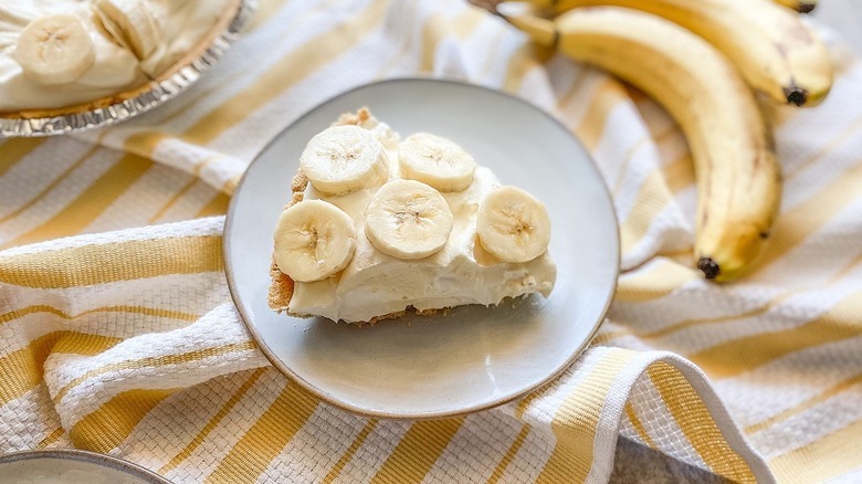 slice of banana pie sitting on a plate