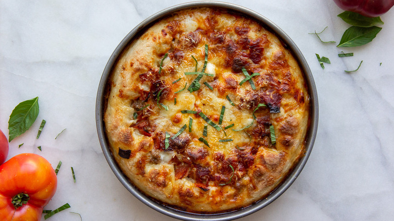 deep dish pizza on granite