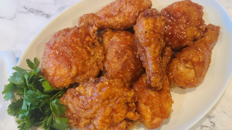 Honey BBQ fried chicken on serving platter