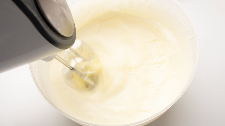 whipping cream and electric beater