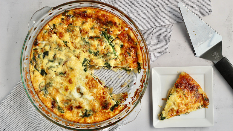 slice and pan of quiche