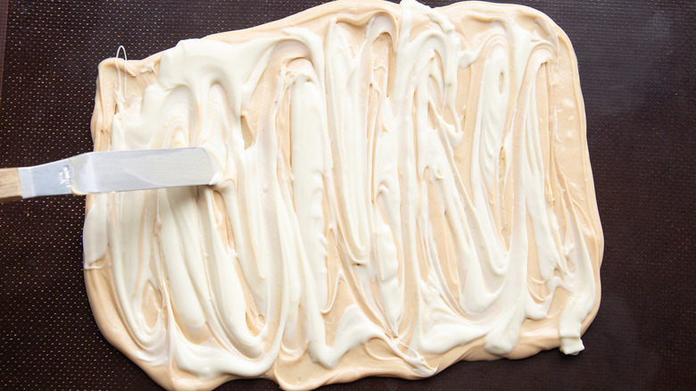 knife spreading white chocolate