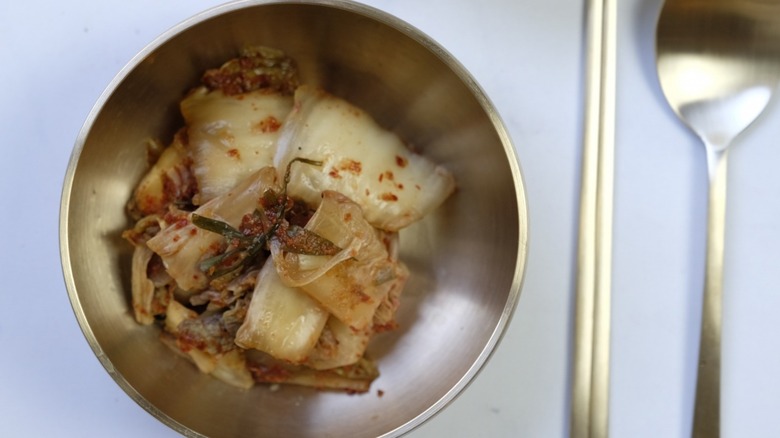 Metal bowl of kimchi