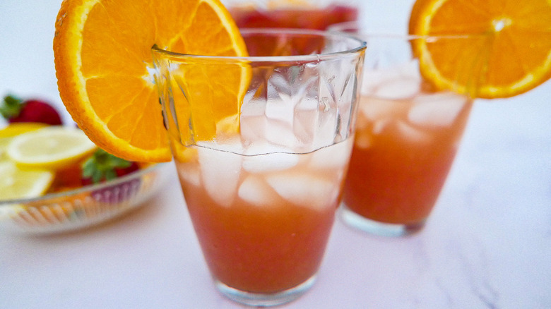 cocktails with orange slice garnish
