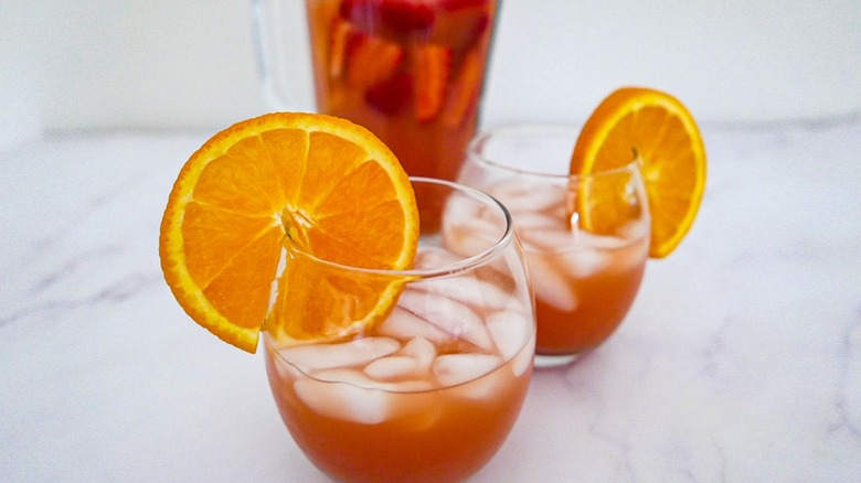 cocktails with orange slice garnish