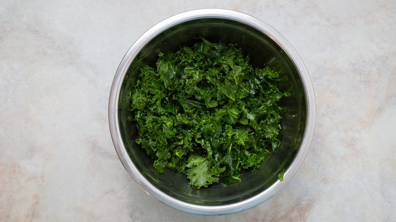 raw kale in large bowl