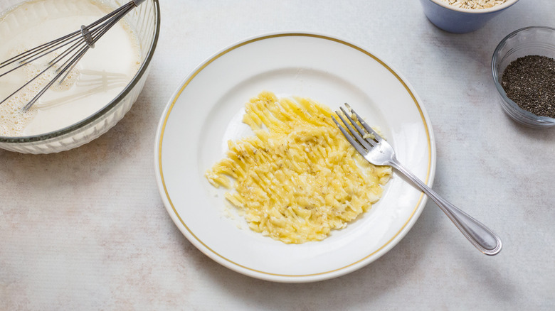 mashed banana on white plate