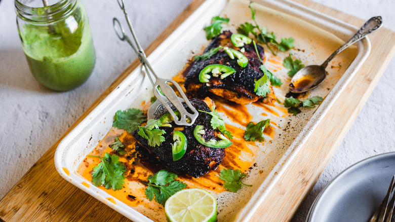 Peruvian chicken on baking sheet 