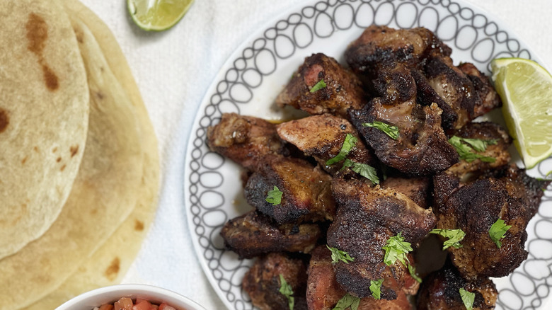 Pork asado served on a plate