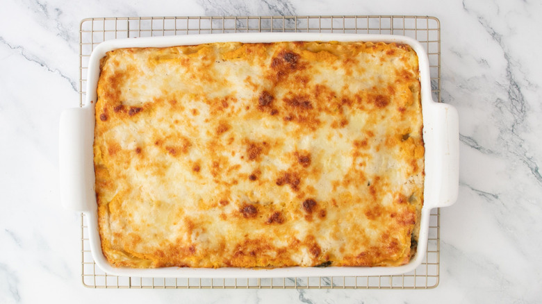 Pumpkin lasagna sitting on top of wire rack