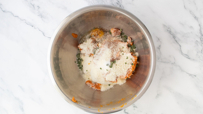 pumpkin ricotta lasagna filling ingredients unmixed in bowl