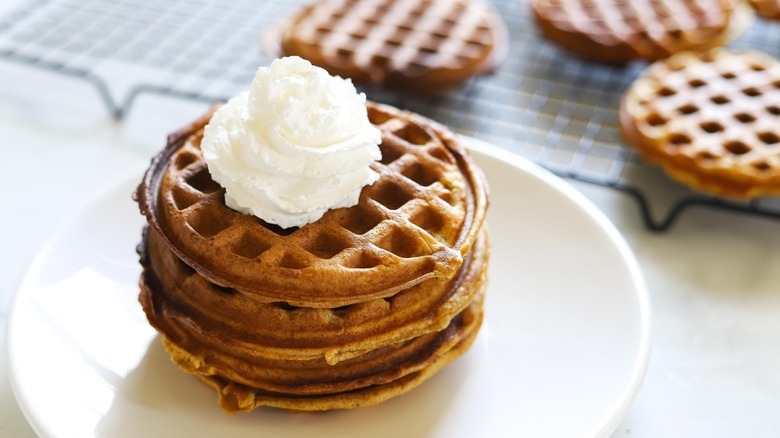 Pumpkin waffles with whipped cream