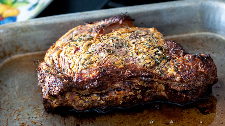 cooked roast beef in pan