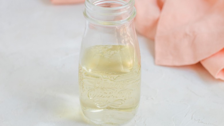 syrup in jar with napkin