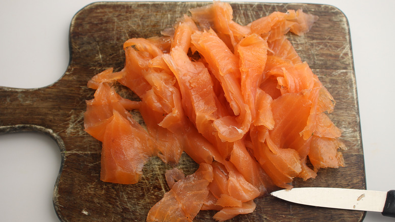 smoked salmon on cutting board 