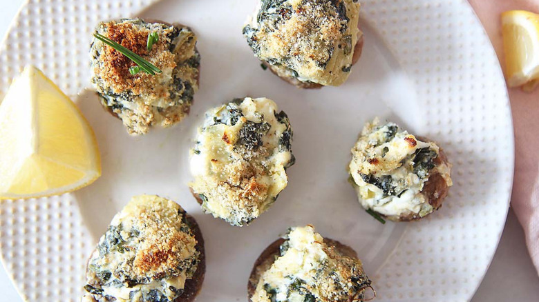 stuffed mushrooms on white plate 